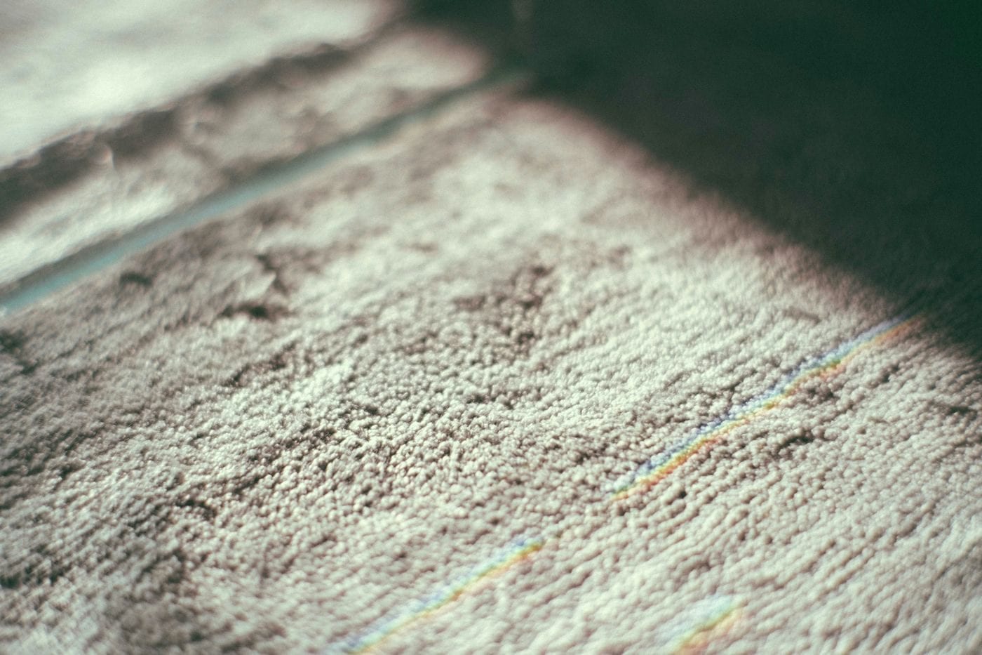 Does Carpet Actually Lower Rent? Flooring Mistakes That Cost Investors